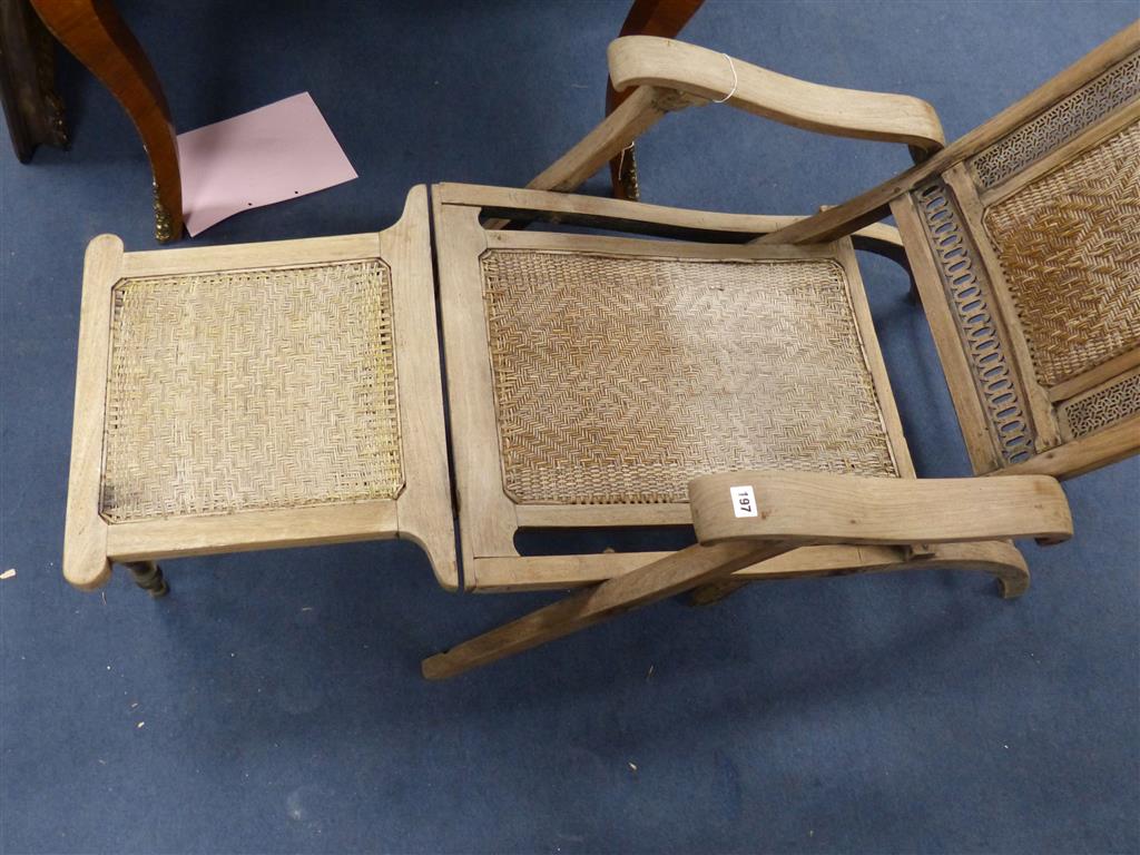 An Anglo Indian caned bleached hardwood steamer chair